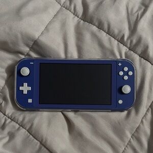 Nintendo Switch Lite + Accessories